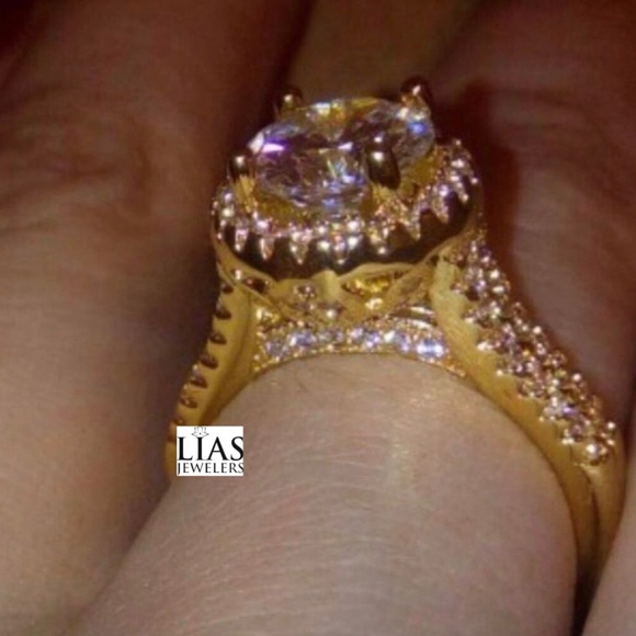 New 18k yellow gold engagement ring